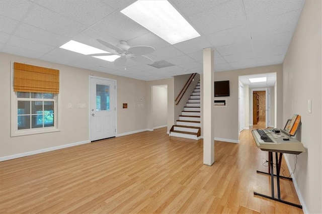 3122 Harmony Rd, Temple, GA 30179 - foyer entrance with light wood-style floors, stairs, a drop ceiling, and ceiling fan