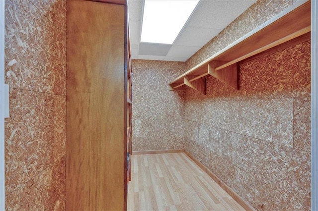 3122 Harmony Rd, Temple, GA 30179 - walk in closet with light wood finished floors and a drop ceiling