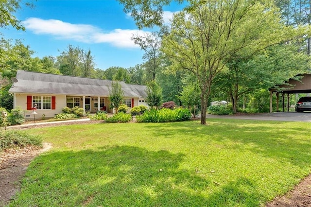 3122 Harmony Rd, Temple, GA 30179 - view of front facade with a front lawn, a carport, and asphalt driveway