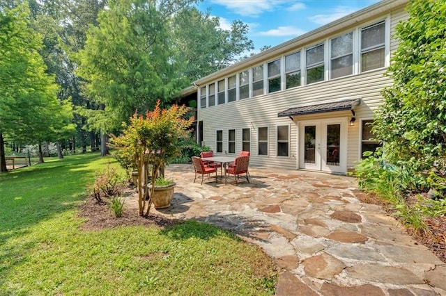 3122 Harmony Rd, Temple, GA 30179 - back of house with french doors, a patio area, and a lawn
