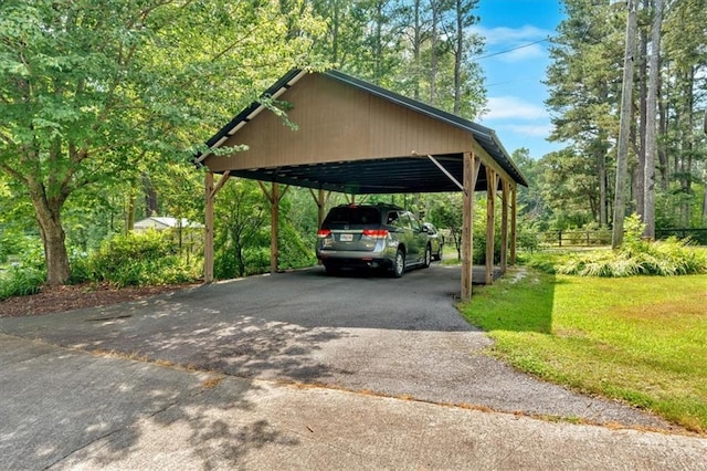 3122 Harmony Rd, Temple, GA 30179 - view of parking featuring asphalt driveway and a detached carport