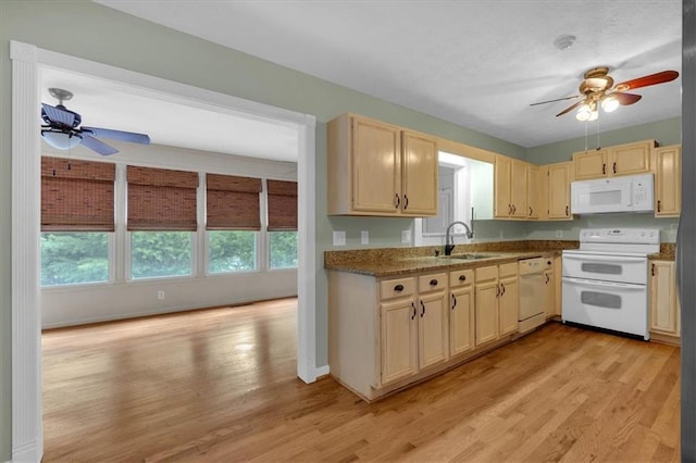 3122 Harmony Rd, Temple, GA 30179 - kitchen with white appliances, ceiling fan, and light brown cabinetry