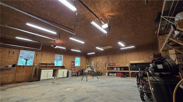 3122 Harmony Rd, Temple, GA 30179 - garage featuring a workshop area