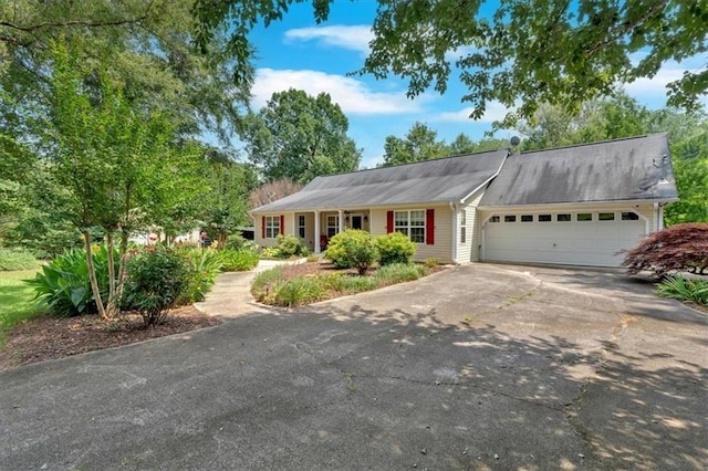 3122 Harmony Rd, Temple, GA 30179 - ranch-style home with asphalt driveway and a garage