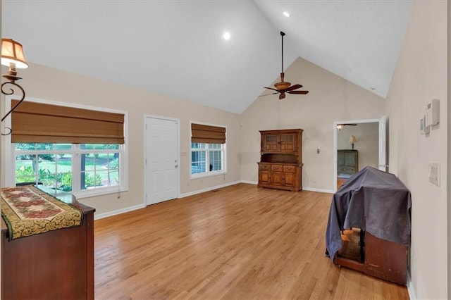 3122 Harmony Rd, Temple, GA 30179 - unfurnished living room featuring ceiling fan, high vaulted ceiling, light wood-type flooring, and recessed lighting