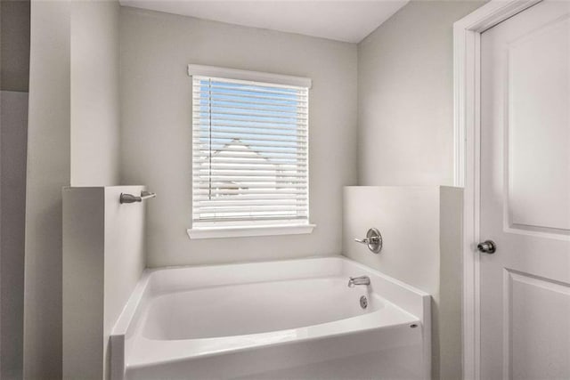 full bath with a garden tub