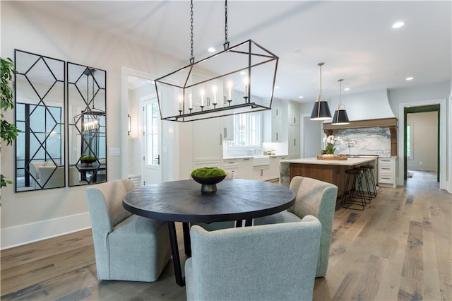 541 Londonberry Rd, Atlanta, GA 30327 - dining space featuring wood finished floors, baseboards, a chandelier, and recessed lighting