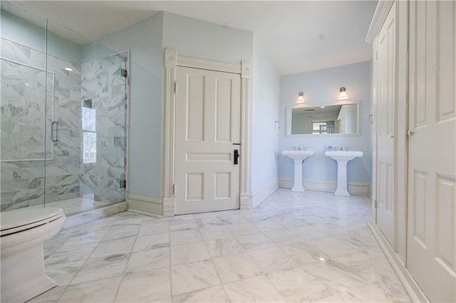 full bathroom featuring marble finish floor, baseboards, toilet, and a marble finish shower