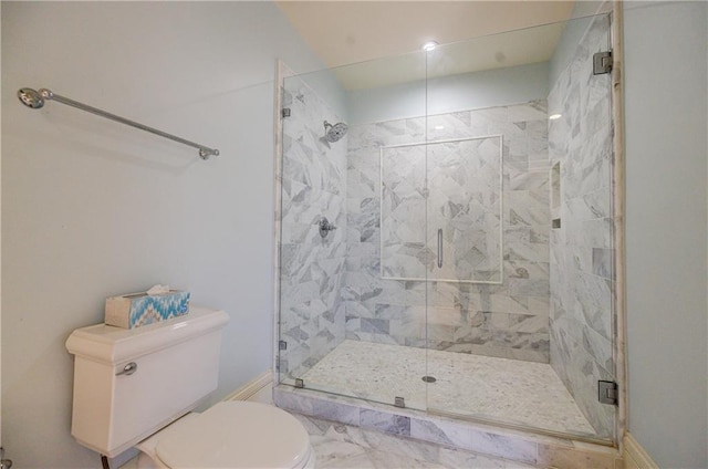 full bathroom featuring toilet and a stall shower