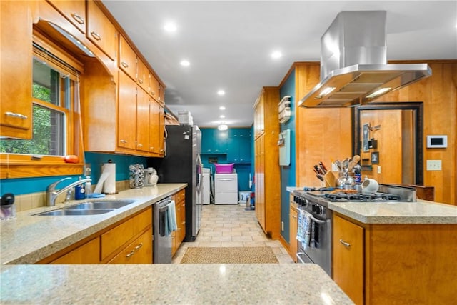1138 Berkeley Rd, Avondale Estates, GA 30002 - kitchen featuring a sink, appliances with stainless steel finishes, island exhaust hood, washing machine and clothes dryer, and brown cabinets
