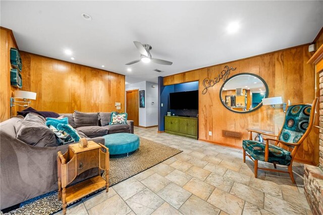 1138 Berkeley Rd, Avondale Estates, GA 30002 - living area with wooden walls, a ceiling fan, stone tile floors, and recessed lighting
