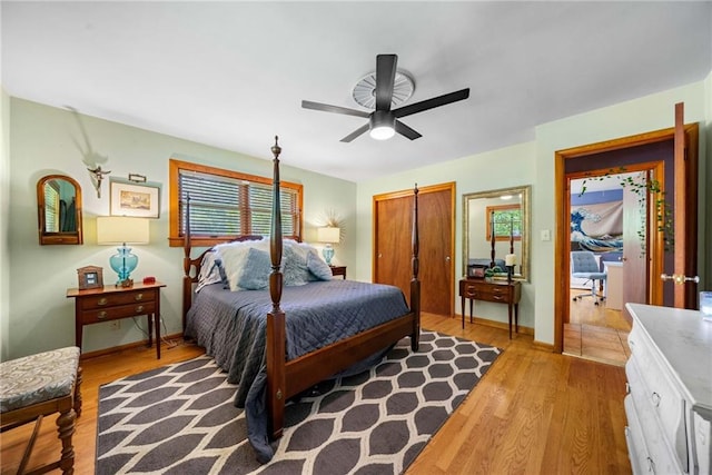 1138 Berkeley Rd, Avondale Estates, GA 30002 - bedroom with wood finished floors, baseboards, a closet, and ceiling fan
