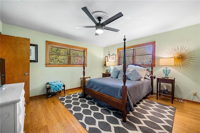 1138 Berkeley Rd, Avondale Estates, GA 30002 - bedroom with baseboards, wood finished floors, and ceiling fan