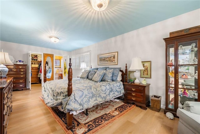 1138 Berkeley Rd, Avondale Estates, GA 30002 - bedroom with light wood-style floors, a spacious closet, and a closet
