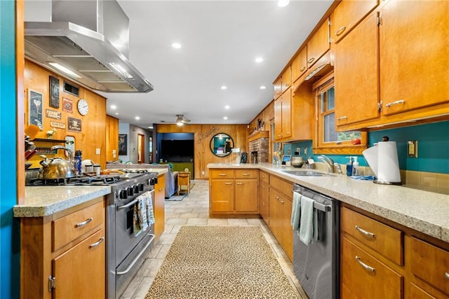 1138 Berkeley Rd, Avondale Estates, GA 30002 - kitchen with appliances with stainless steel finishes, a sink, wall chimney range hood, brown cabinets, and recessed lighting