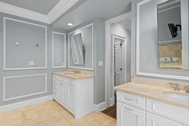 bathroom with vanity and crown molding