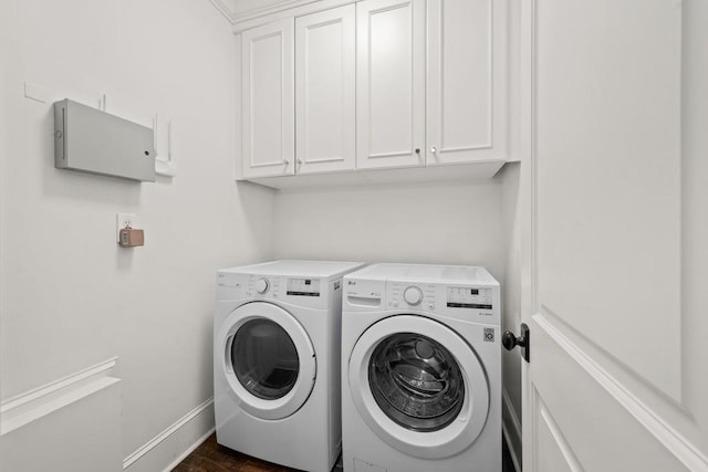 laundry area featuring cabinets and washer and dryer