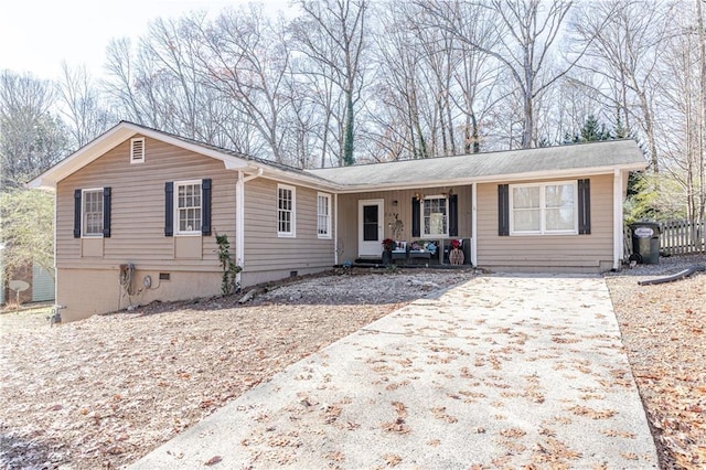 single story home featuring covered porch