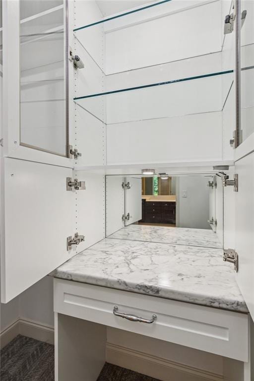 328 Shade Tree Cir, Woodstock, GA 30188 - kitchen featuring white cabinets and light stone counters