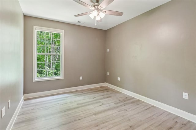 328 Shade Tree Cir, Woodstock, GA 30188 - unfurnished room featuring light wood finished floors and ceiling fan