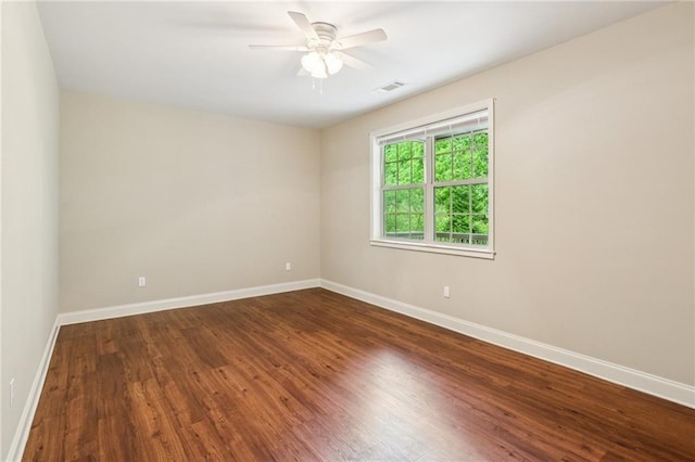 328 Shade Tree Cir, Woodstock, GA 30188 - spare room featuring wood finished floors and a ceiling fan