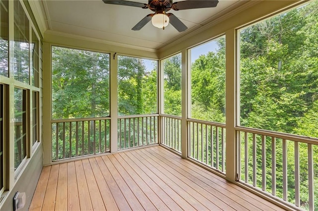 328 Shade Tree Cir, Woodstock, GA 30188 - unfurnished sunroom with ceiling fan, hardwood / wood-style floors, crown molding, and a deck