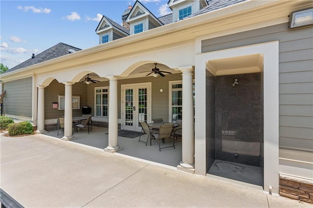 328 Shade Tree Cir, Woodstock, GA 30188 - entrance to property with outdoor dining space, a ceiling fan, a patio area, french doors, and a shingled roof