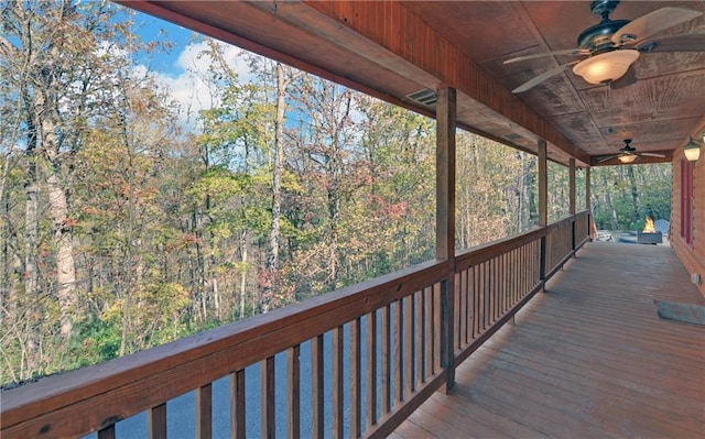 wooden terrace with ceiling fan