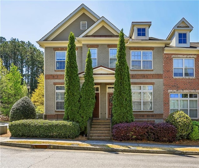 7275 Highland Blf Unit 8, Atlanta, GA 30328 - view of front of home featuring brick siding