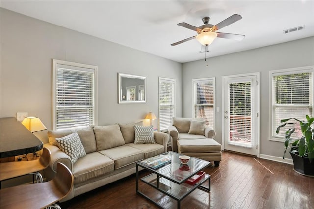 7275 Highland Blf Unit 8, Atlanta, GA 30328 - living room featuring a ceiling fan and dark wood-style flooring