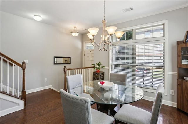 7275 Highland Blf Unit 8, Atlanta, GA 30328 - dining space featuring plenty of natural light, stairway, a chandelier, wood finished floors, and ornamental molding