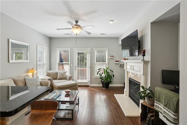 7275 Highland Blf Unit 8, Atlanta, GA 30328 - living room featuring a ceiling fan, a premium fireplace, and dark wood-style flooring