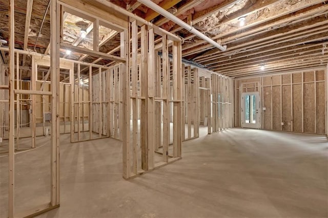 misc room with concrete floors
