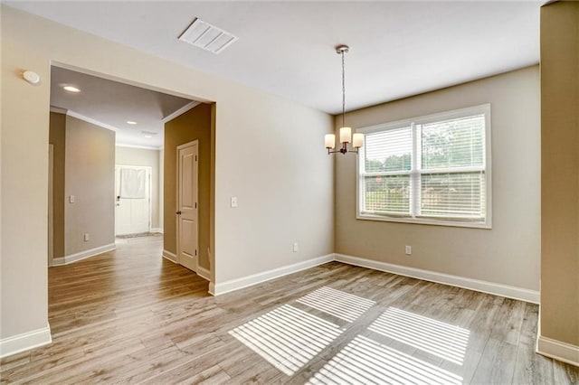 1858 Belmore St SE, Smyrna, GA 30080 - unfurnished room featuring a chandelier, light wood-style flooring, recessed lighting, and ornamental molding