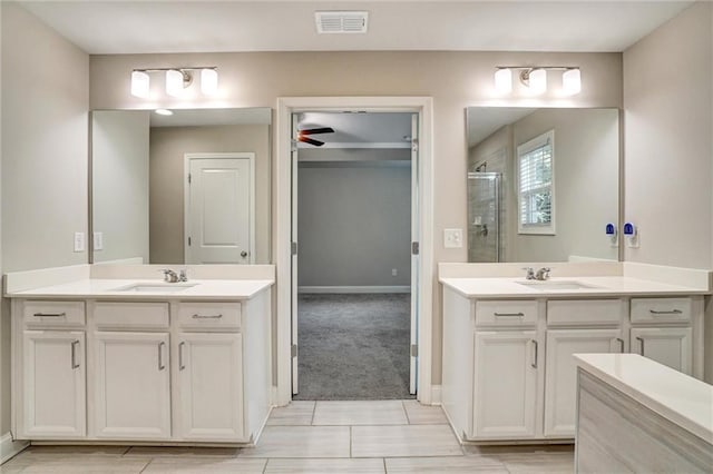 1858 Belmore St SE, Smyrna, GA 30080 - bathroom with a shower stall, two vanities, and ceiling fan