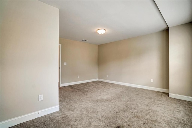 1858 Belmore St SE, Smyrna, GA 30080 - carpeted empty room featuring baseboards