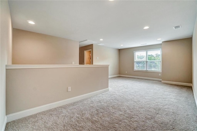1858 Belmore St SE, Smyrna, GA 30080 - empty room with carpet floors and recessed lighting