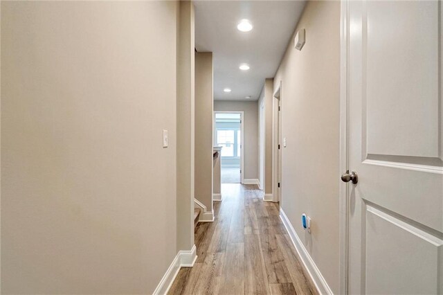 1858 Belmore St SE, Smyrna, GA 30080 - hallway with light wood-style flooring and recessed lighting