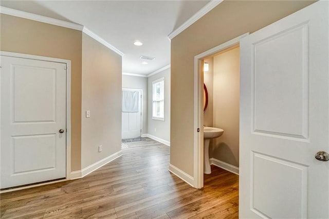 1858 Belmore St SE, Smyrna, GA 30080 - hall with ornamental molding, wood finished floors, and recessed lighting