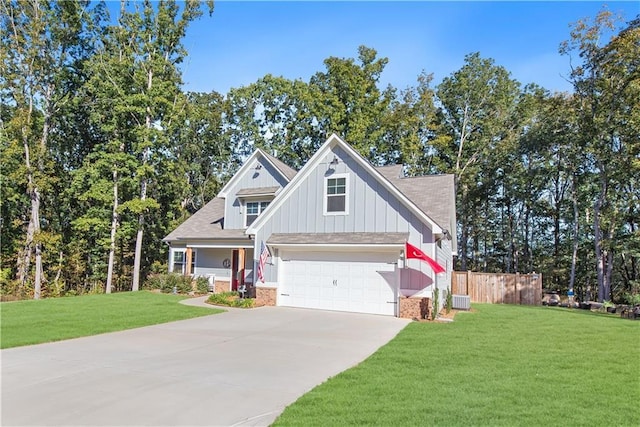 craftsman-style home featuring a garage, a front yard, and central AC