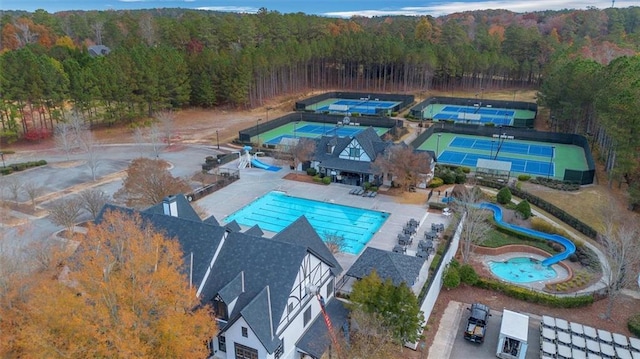 drone / aerial view with a view of trees