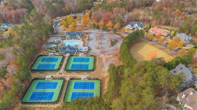 bird's eye view featuring a forest view