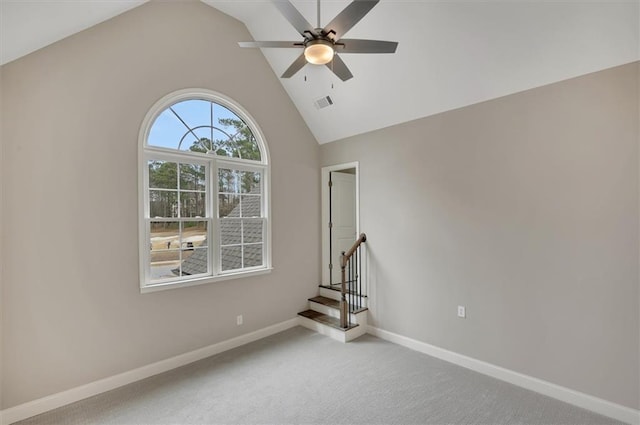 empty room featuring baseboards, visible vents, a ceiling fan, stairway, and carpet flooring