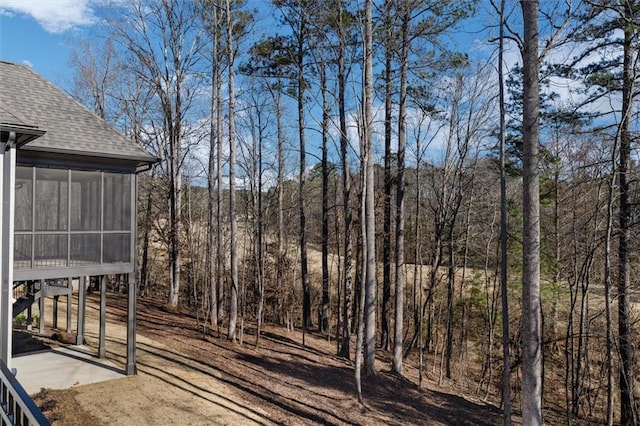 view of yard with a sunroom