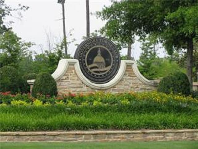 view of community sign