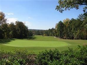 view of community featuring golf course view