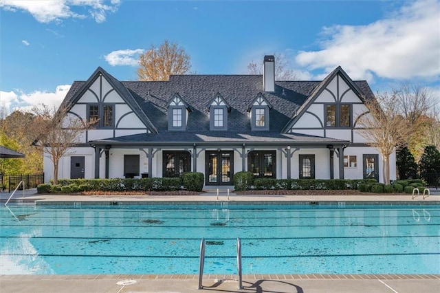 pool with french doors