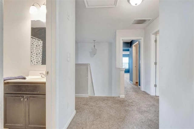 529 Dasheill Ln, Atlanta, GA 30349 - hallway with carpet flooring and baseboards