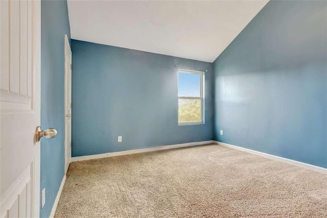 529 Dasheill Ln, Atlanta, GA 30349 - spare room with carpet and lofted ceiling