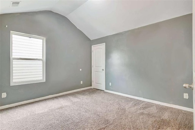 529 Dasheill Ln, Atlanta, GA 30349 - unfurnished room featuring vaulted ceiling and carpet floors
